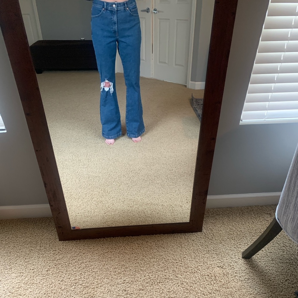 Size 10 high rise flare with distress, medium denim color from Express